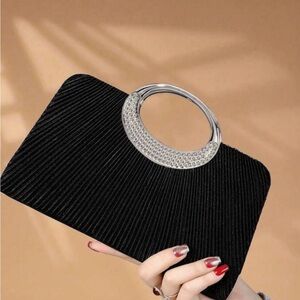 Chic Black Clutch with Silver Handle
